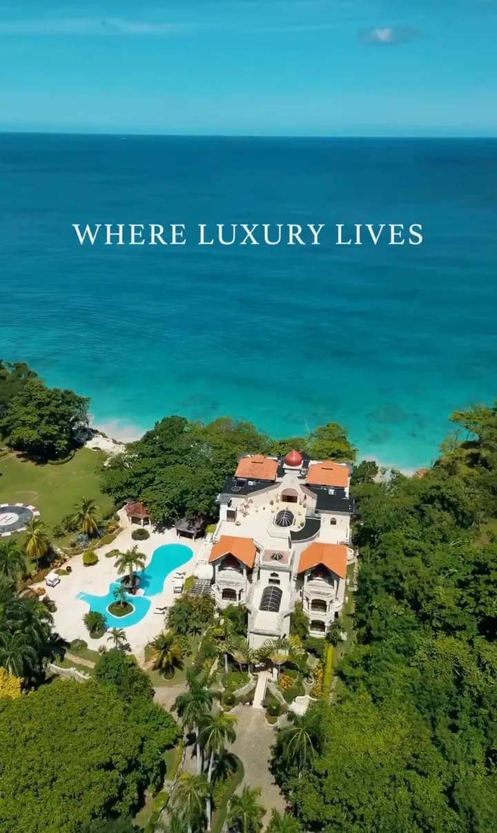 Luxury real estate creative with an aerial view of a coastal estate